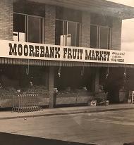 The Moorebank Fruit Market storefront, with wholesale and retail painted on the sign above the awning.
