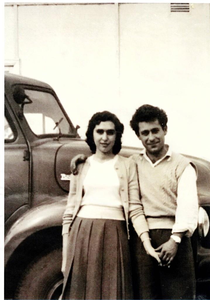Tony and Mary Simonetta standing together in front of a truck, Sydney, mid-1950s.